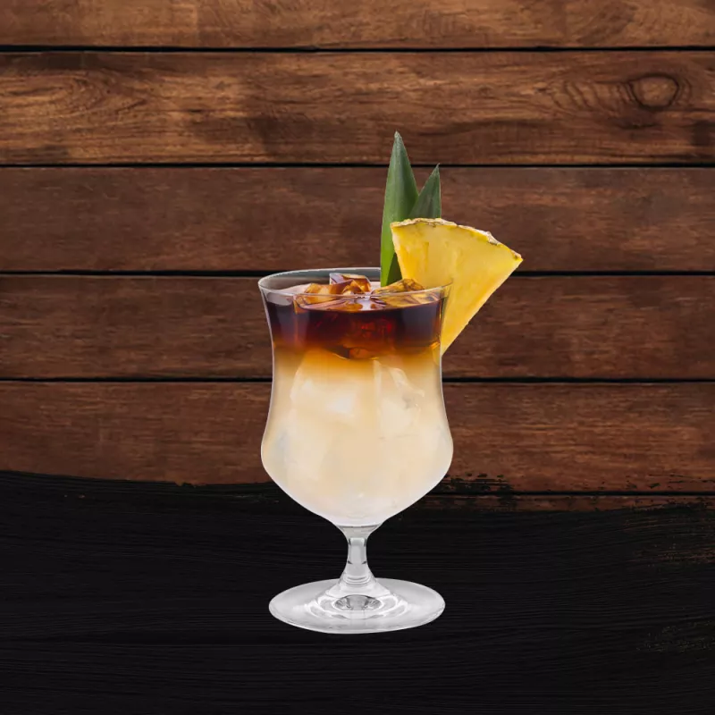 Cruzan® Black Strap Mai Tai drink in a clear cocktail glass garnished with a pineapple wedge set against a dark oak wood background with a black paint swash.