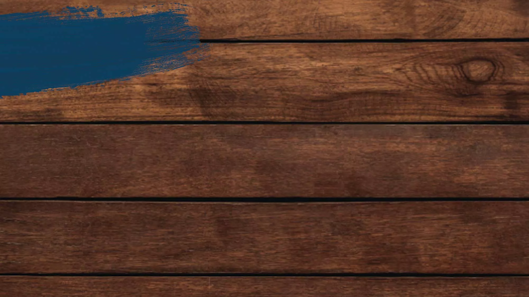 Dark oak wood background with a blue paint swash.