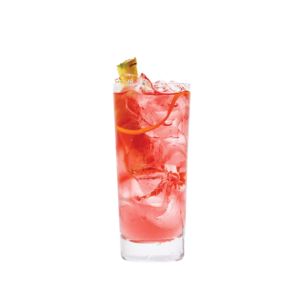 Passion Punch in a tall glass, garnished with pineapple and an orange rind.