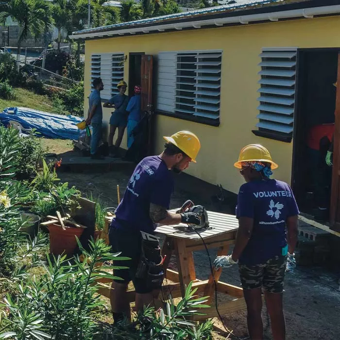 Volunteers help rebuild and fix up homes after a hurricane hit St. Croix.
