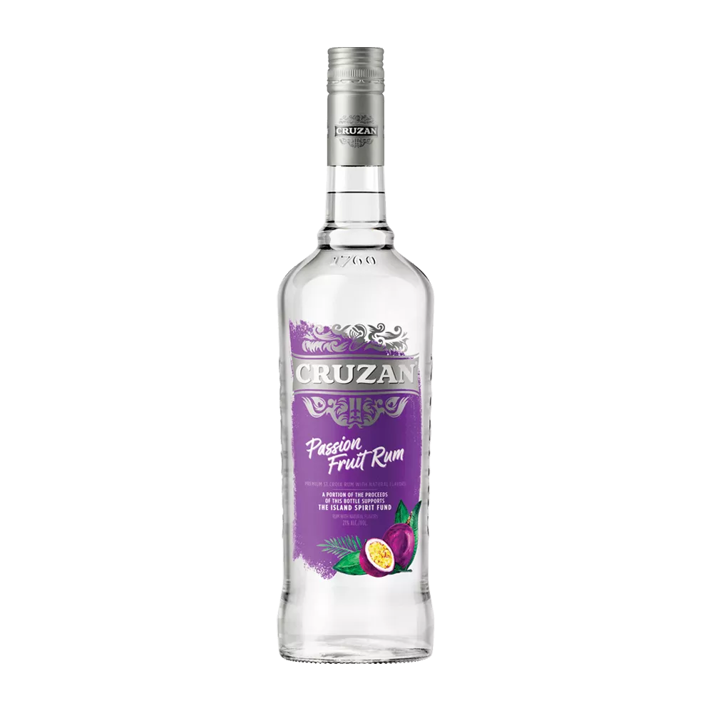 Clear glass bottle of Cruzan Passion Fruit Rum with a royal purple label and decorated with passion fruit.